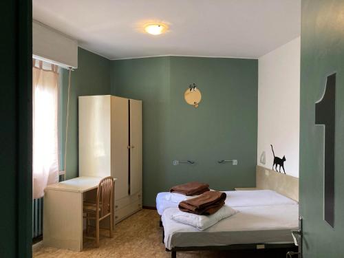 Postel nebo postele na pokoji v ubytování Route77 hostel