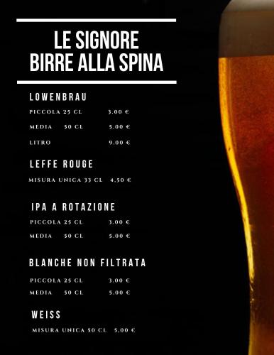 a poster for a beer festival with a glass of beer at Route77 hostel in Toscolano Maderno