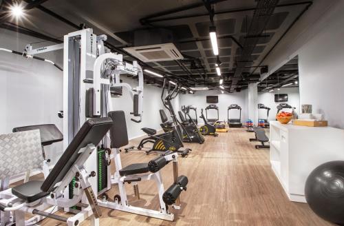 a gym with treadmills and cardio machines at Meliá Paulista in Sao Paulo