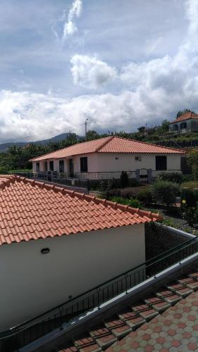 a view of a building with a roof at Villas Madalena Chalets vista mar cWiFi in Santa Cruz