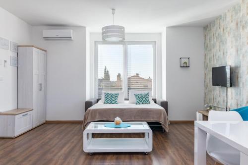 Ένα ή περισσότερα κρεβάτια σε δωμάτιο στο Villa Cindrić