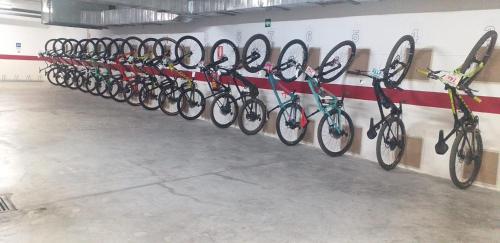 a row of bikes lined up against a wall at Gce Hoteles in Málaga
