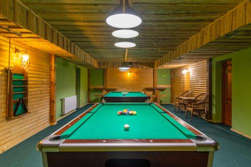 a billiard room with a pool table in it at Laguna in Slavske