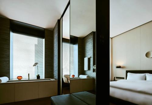 Cama o camas de una habitación en The Puli Hotel And Spa