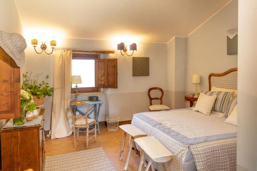 Postel nebo postele na pokoji v ubytování Villa Pardi