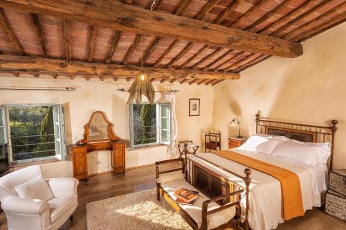 Ένα ή περισσότερα κρεβάτια σε δωμάτιο στο Villa Cicolina