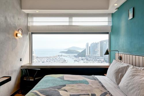 A bed or beds in a room at the Arca