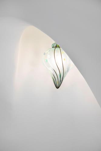 a glass flower on a white background at YourHome - Casa Ivi Positano in Positano