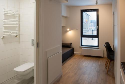 Kúpeľňa v ubytovaní TPS Apartamenty Olimpijskie
