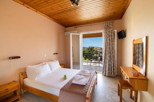 Postel nebo postele na pokoji v ubytování Artemis Pension
