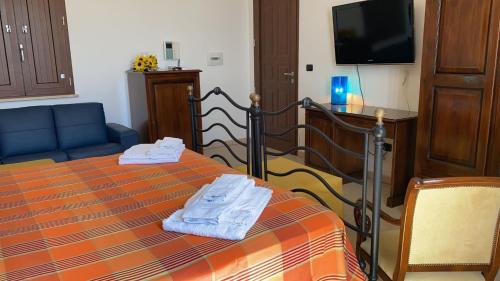 Ένα ή περισσότερα κρεβάτια σε δωμάτιο στο B&b Cocuma
