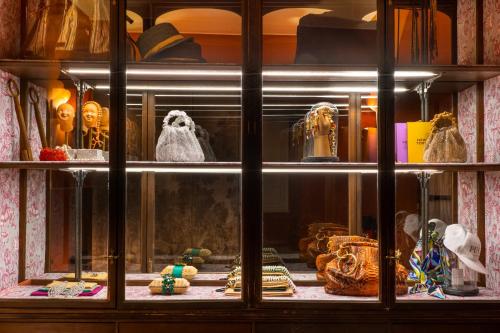 a display case with a bunch of items in it at Q92 Noto in Noto