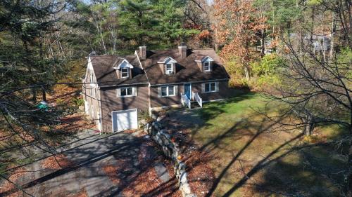 an aerial view of a house in the woods at Private Berkshire Escape Special April Pricing select your dates for discount Monthly Pricing in Lee
