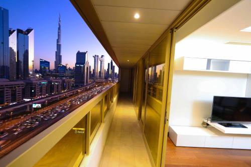a view from a balcony of a building with a view of a city at Number One Tower Suites in Dubai
