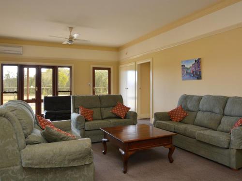 A seating area at Grasmere Estate Homestead - hear the Lions roar from nearby Hunter Valley Zoo