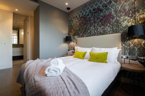 Katil atau katil-katil dalam bilik di Urban Rest Camden