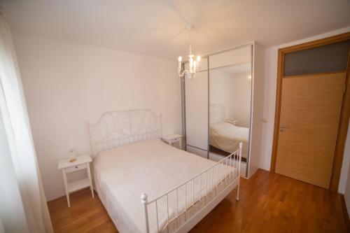 Postel nebo postele na pokoji v ubytování Apartment Plamenatz