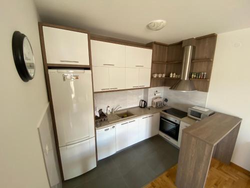 Kuchyň nebo kuchyňský kout v ubytování Apartment Nena