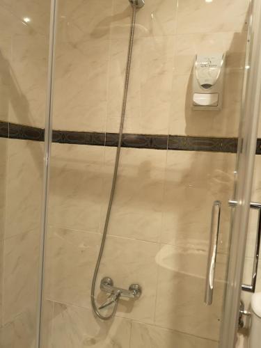 Ванная комната в Hostal Plaza