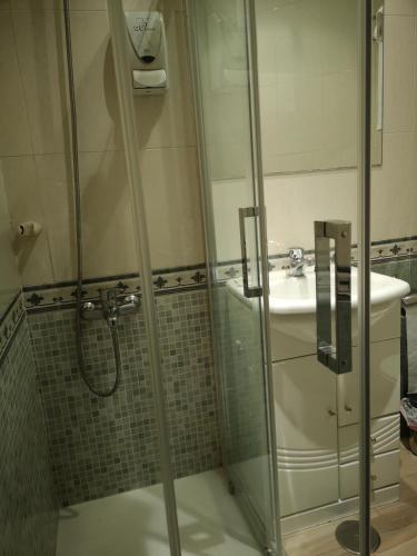 Ванная комната в Hostal Plaza