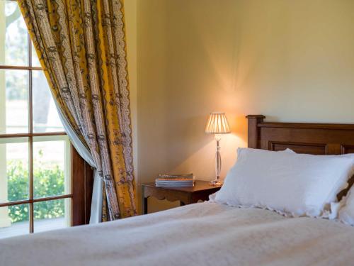 Кровать или кровати в номере Roscrea Homestead Premier Homestead Accommodation
