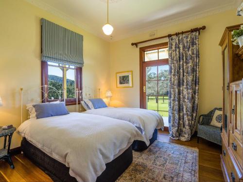 Ένα ή περισσότερα κρεβάτια σε δωμάτιο στο Roscrea Homestead Premier Homestead Accommodation