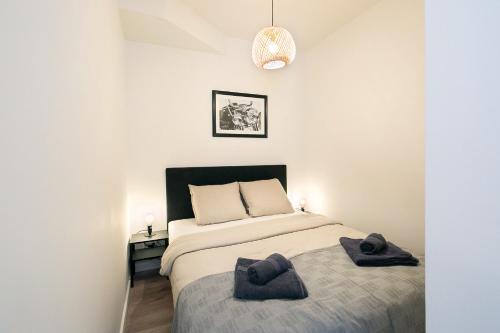 Katil atau katil-katil dalam bilik di Four Star Apartments - Badhuisstraat