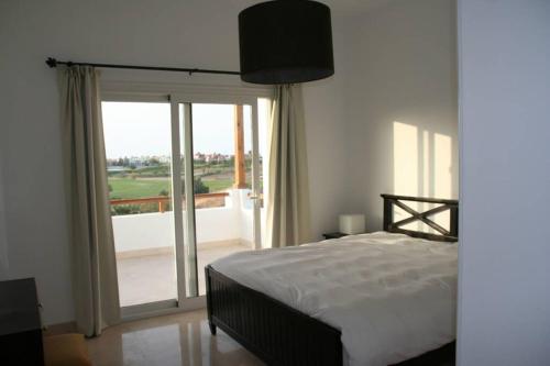 Posteľ alebo postele v izbe v ubytovaní Villa with 5 bedrooms & 4 bathrooms - private heated pool