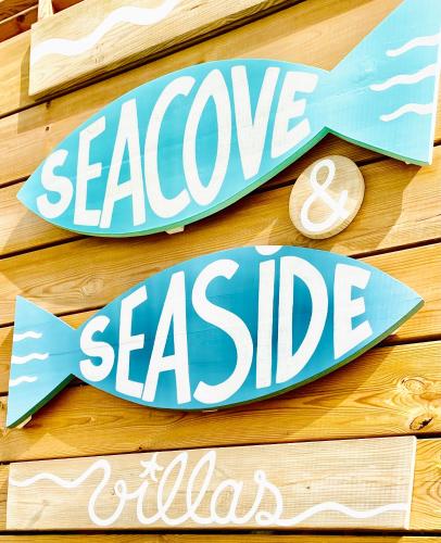 SeaCove & SeaSide Villas, classées 4 étoilesに飾ってある許可証、賞状、看板またはその他の書類