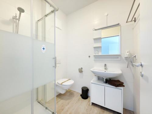 Kylpyhuone majoituspaikassa Pension Voesendorf