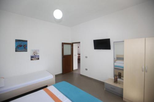 Ένα ή περισσότερα κρεβάτια σε δωμάτιο στο Villa Oden