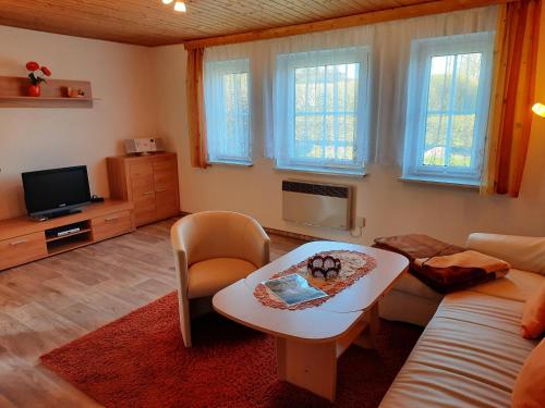 Ein Sitzbereich in der Unterkunft Leuchtturmblick - Ferienwohnung für die Familie in Grieben Insel Hiddensee