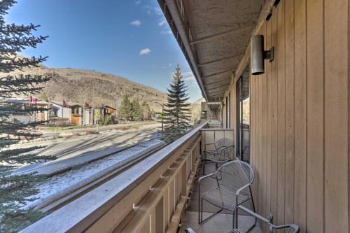 a balcony with chairs and a view of a mountain at Updated Condo Walk to Vail Village and Ski Shuttle! in Vail