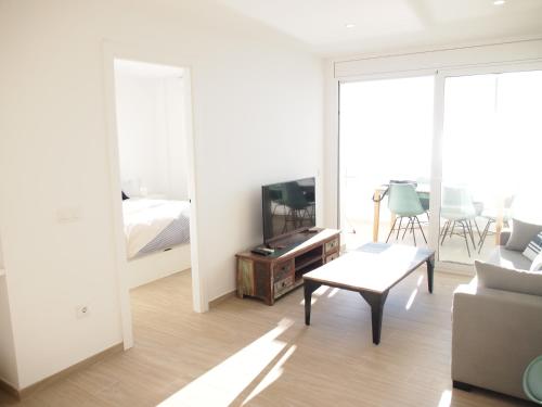 En eller flere senge i et værelse på GRAND PAVOIS 37