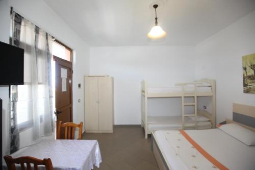 Ένα ή περισσότερα κρεβάτια σε δωμάτιο στο Villa Oden