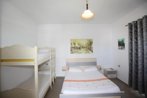 Poschodová posteľ alebo postele v izbe v ubytovaní Villa Oden