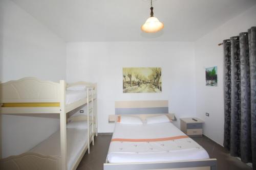 Ένα ή περισσότερα κρεβάτια σε δωμάτιο στο Villa Oden