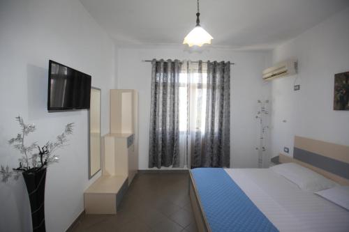 Ένα ή περισσότερα κρεβάτια σε δωμάτιο στο Villa Oden