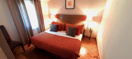 Logis Hôtel Fabian des Bauxにあるベッド