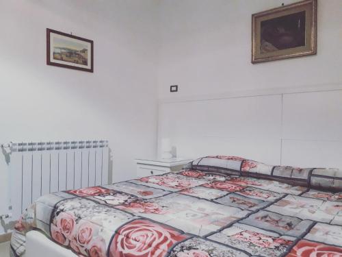 Postel nebo postele na pokoji v ubytování La Locanda del Baffo