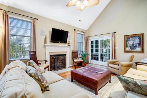 a living room with a couch and a fireplace at Bayside Bethany Lakes - S Mill #177 in Ocean View