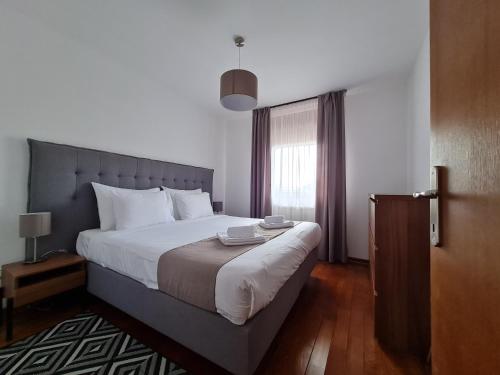 Postel nebo postele na pokoji v ubytování Apartman Esperanza