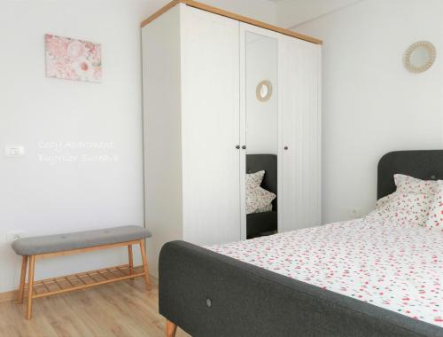 Säng eller sängar i ett rum på Cozy Apartment Bujorilor Suceava