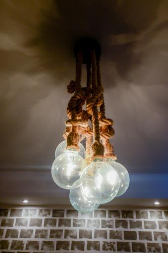 a chandelier is hanging from a ceiling at CENTRO PATRAS in Patra