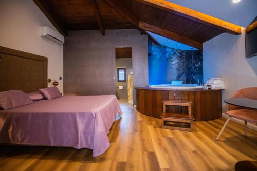 Postel nebo postele na pokoji v ubytování Hotel Vogue
