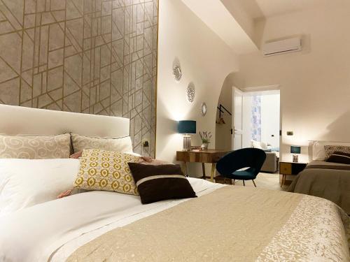 Katil atau katil-katil dalam bilik di Palazzo Bianchi - Trani