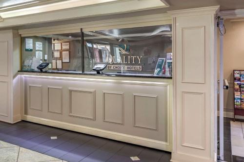 a restaurant counter with a phone in a building at Quality Inn Duluth - Atlanta Northeast in Duluth