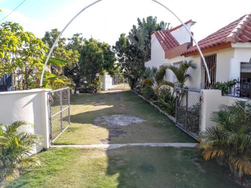 a gate in the yard of a house at El Conde de Villa Rosa in Salado