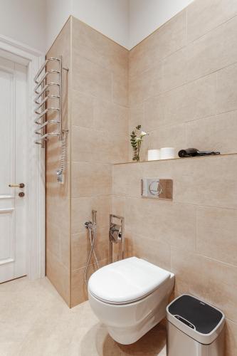 a bathroom with a toilet and a shower at NEW! Luxury apartment in the CENTER of ODESSA overlooking Deribasovskaya str. LOW PRICE! in Odesa