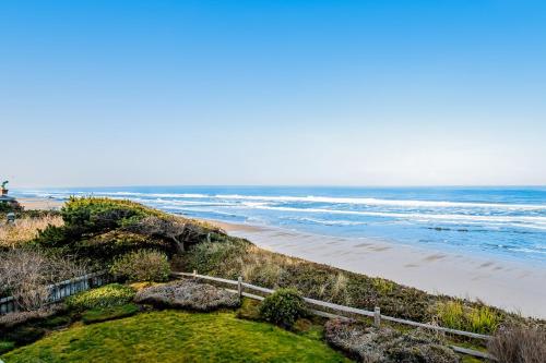 a view of a beach with the ocean at Surf and Sand in Lincoln City